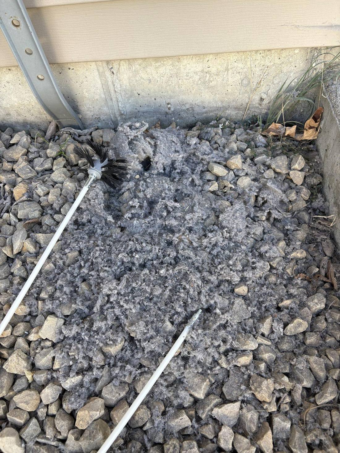 Pile of lint and debris removed from a dryer vent
